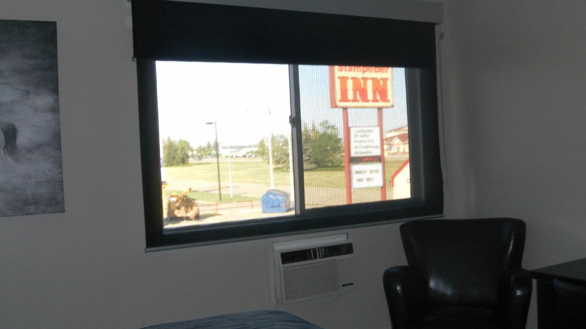 Stampeder Inn Ponoka Habitación foto